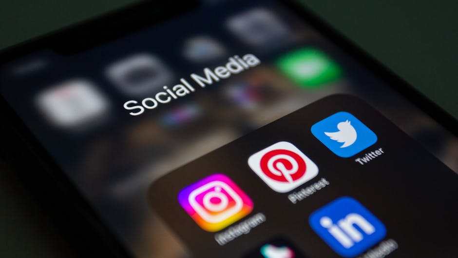 pexels-photo-15406294-15406294 A smartphone screen displaying popular social media applications like Instagram and Twitter.